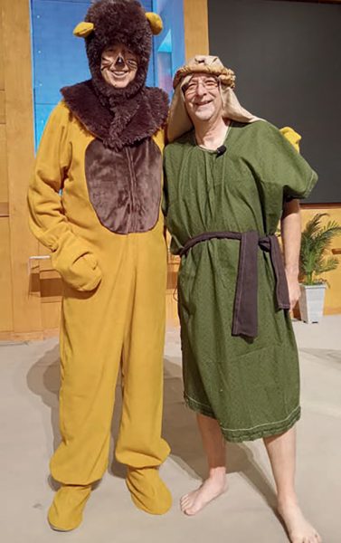 Paradise Valley Seventh-day Adventist Children’s Church Leader Dave Nelson (left) and Pastor Paul Blake (right) dressed in costume as the lion and Shadrach.