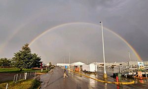 A rainbow fills the sky immediately after the storm tore through the camporee.