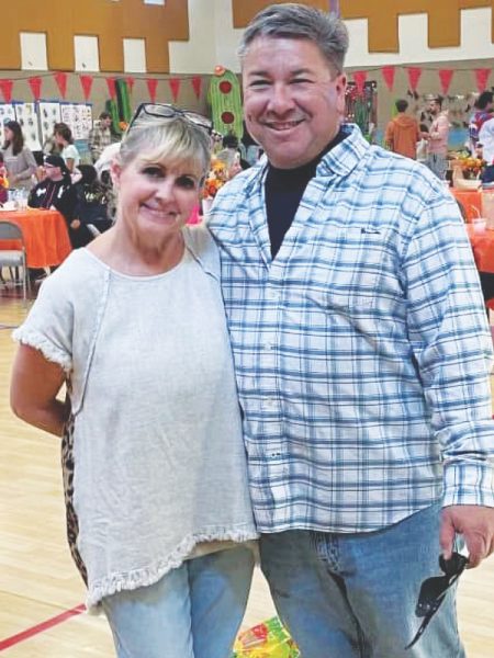 Tracy Pieters, the Fall Festival organizer, poses with her husband, Josh.